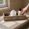 Hello Sweet Cheeks - a hand going to get a shampoo
