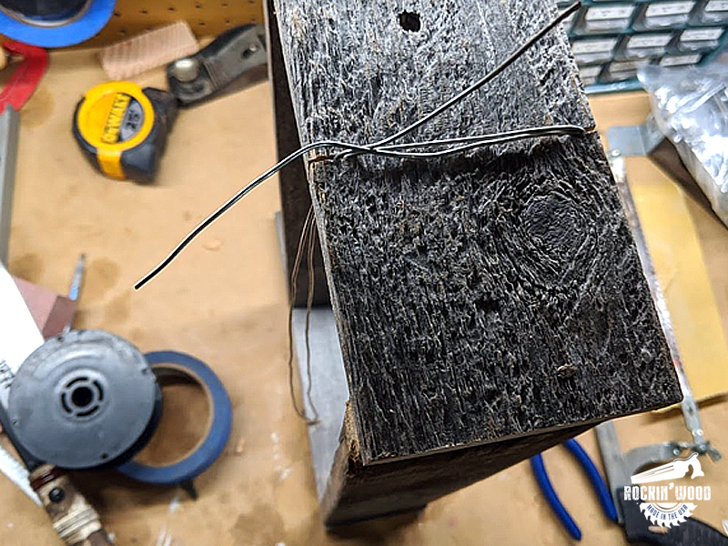 Pull bailing wires tight 