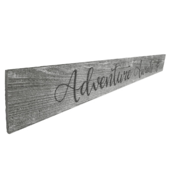Adventure awaits sign - side