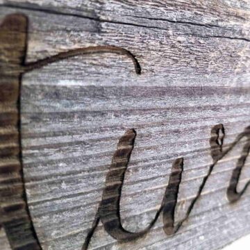 Adventure awaits sign texture